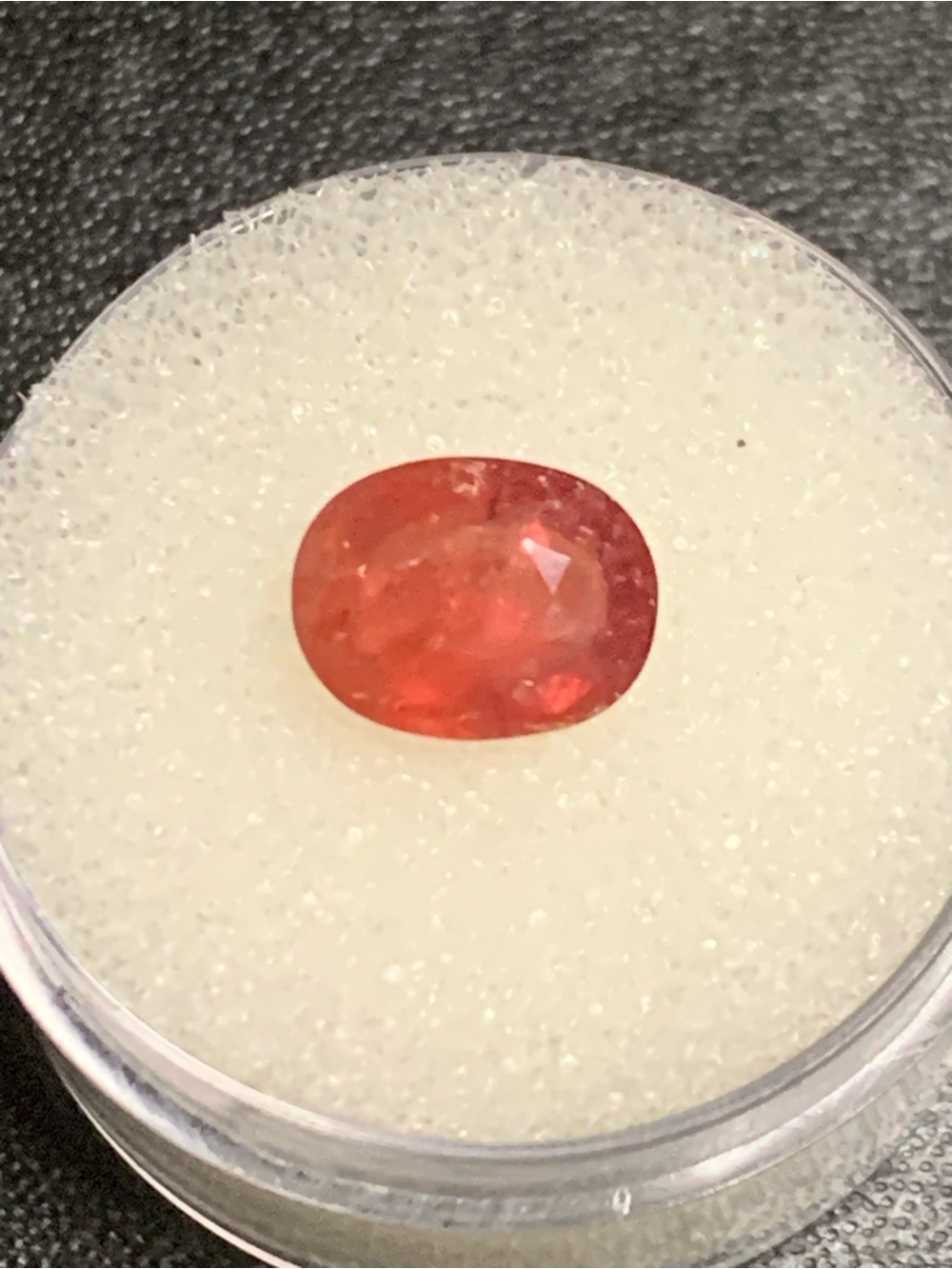 Natural Orange-Pink Faceted Oval Sapphire